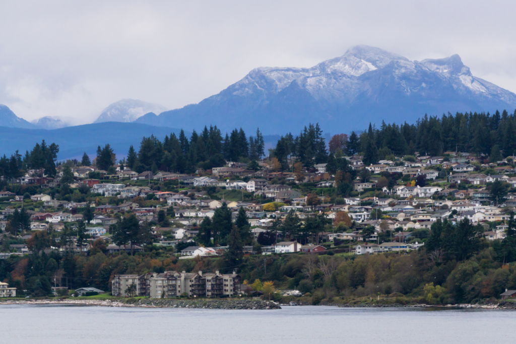 Campbell River through a telephoto lens, compressing the city streets with the largest mountains on Vancouver Island.