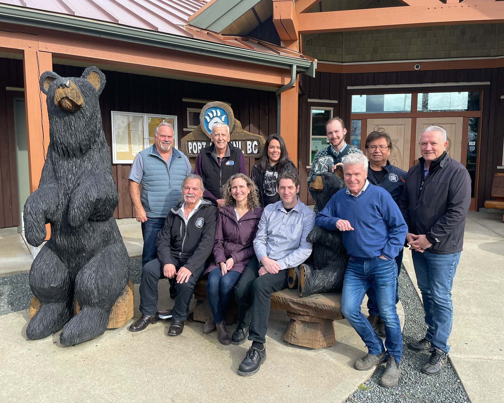 The 10-person team leading the redevelopment of the Alberni Pacific Railway pose together in front of the Port Alberni Visitor Centre
