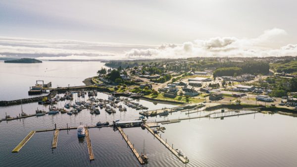 An aerial view of the Port McNeill marina on the north coast of vancouver island during a sunrise.